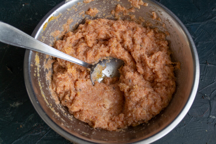 Mixed ground fish with semolina resting in a glass bowl