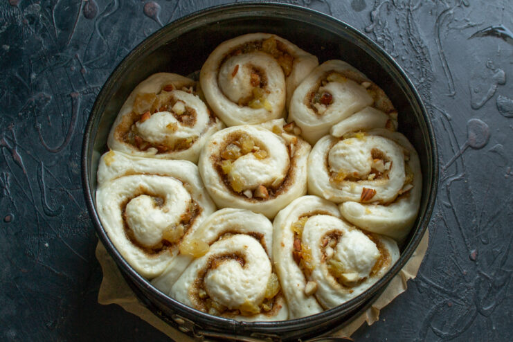 Final dough proofing Shaped dough rolls proofing and expanding inside a round springform pan