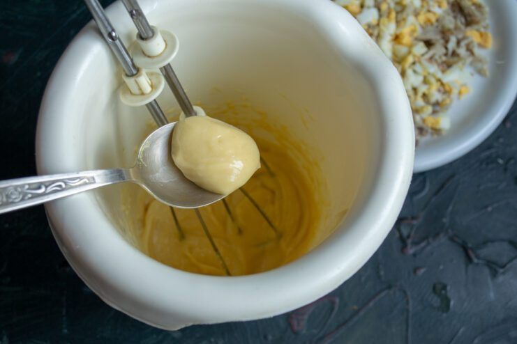 Homemade mayonnaise sauce Making homemade mayonnaise in a blender cup