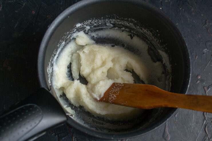 Dumpling base: semolina porridge Cooking thick semolina porridge in a small saucepan