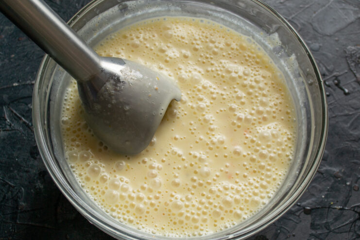 Blending the wet ingredients Blending wet ingredients with an immersion blender until smooth