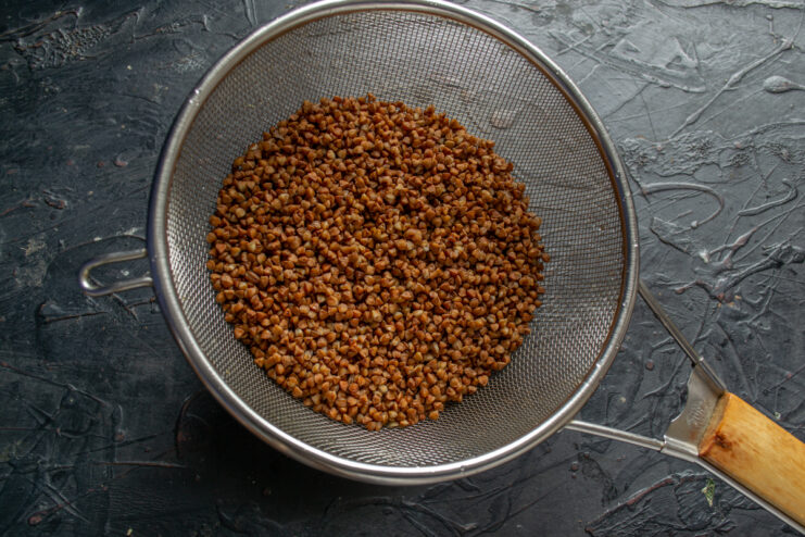 Preparing the Buckwheat Groats Rinsed buckwheat in a metal sieve