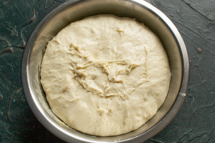 Tripled and airy bread dough in a bowl