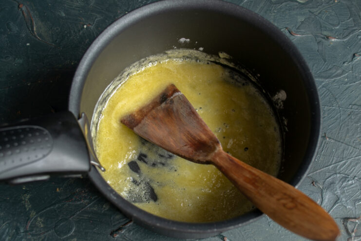 Making the Roux Melted butter and flour cooking together in a saucepan.