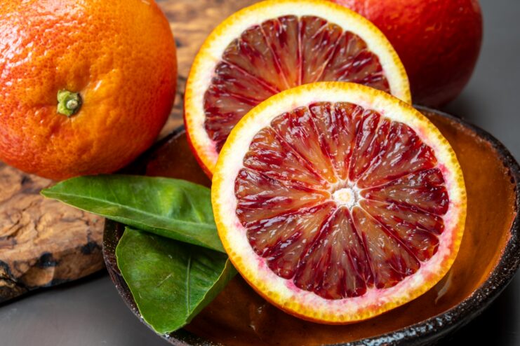 Halved Blood Oranges Sliced Sicilian blood oranges displaying their rich red-pigmented flesh