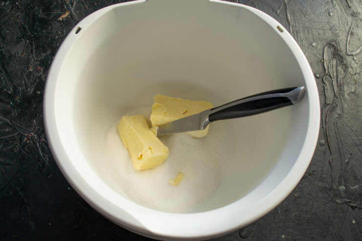 Creaming butter and sugar Softened butter and sugar in a mixing bowl