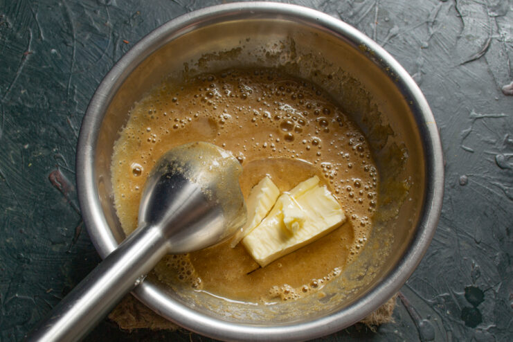 Softened butter added to the blended liquid mixture