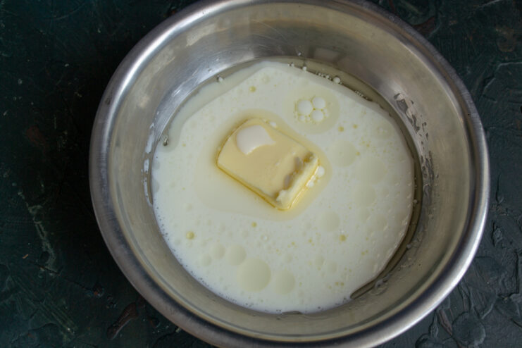 Cream and Butter Mixture Butter melting in cream in a bowl for heating