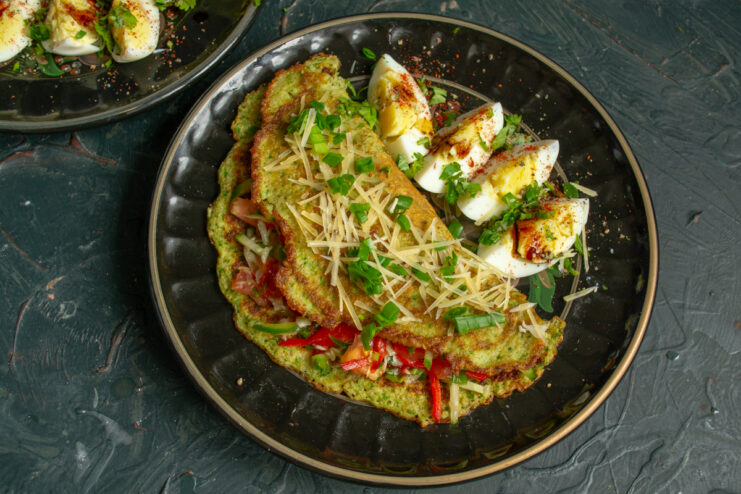 Final presentation Folded oat crepe garnished with cheese and herbs
