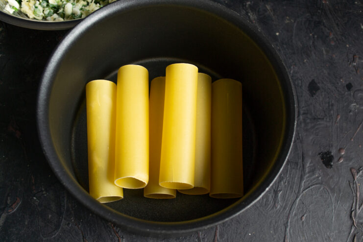 Parboiling the cannelloni tubes Dry cannelloni tubes in a pot of boiling water