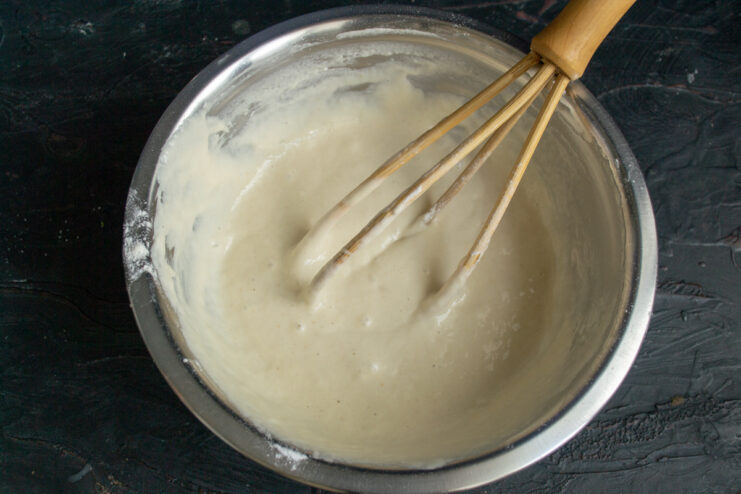 Final batter mixing Thoroughly mixed pancake batter in a bowl