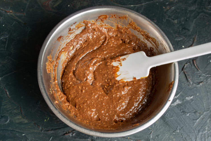 Final mixing of ingredients Stirring the finished chocolate peanut butter with a spatula