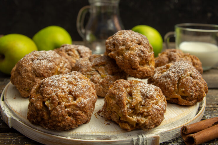 Apple cinnamon tvorog buns resting on a wooden board