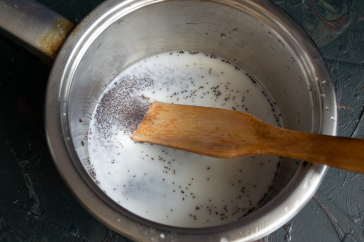 Making the Poppy Seed Filling Simmering poppy seeds with milk and sugar in a saucepan