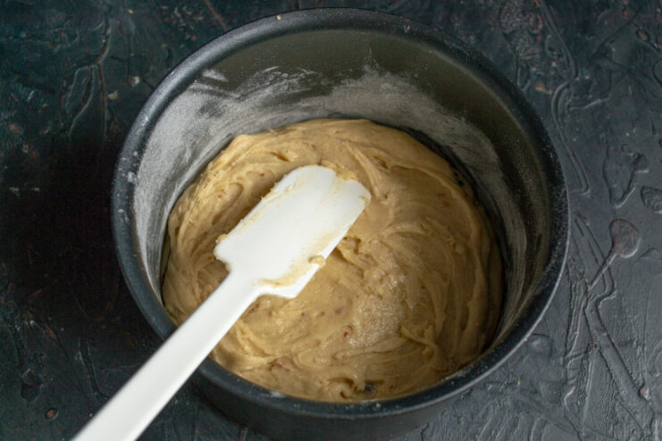 Forming the top layer Second layer of batter spread smoothly over dates