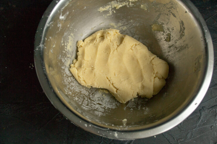 Finished dough Freshly kneaded shortcrust pastry dough for apple soufflé pie