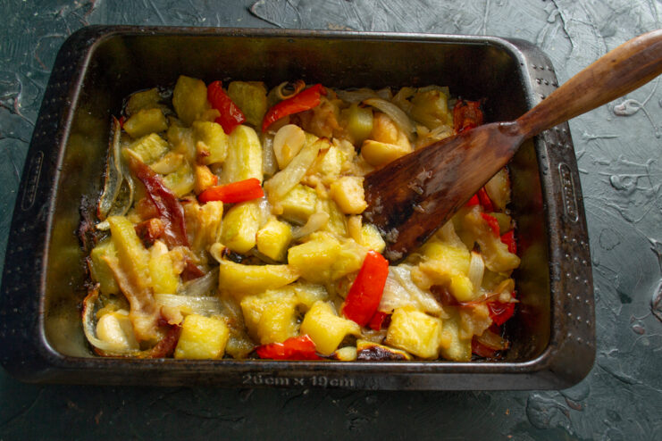 Freshly roasted vegetables Golden-brown roasted vegetables in a deep baking pan