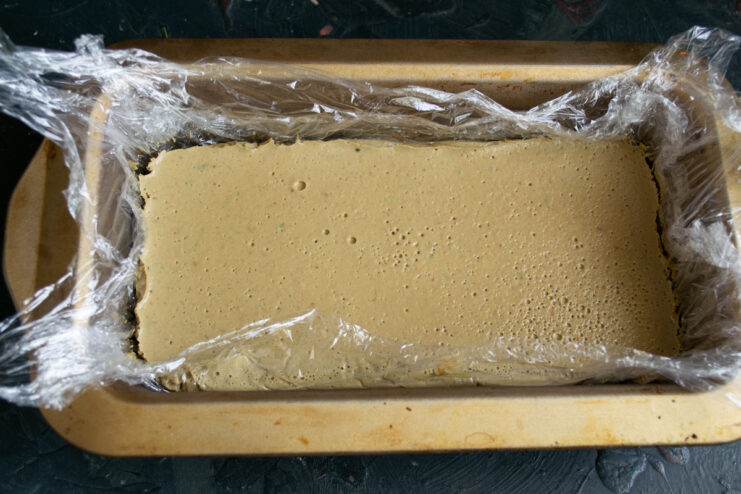 Chilled pâté Firm, chilled chicken liver pâté set inside a plastic wrap-lined loaf pan.