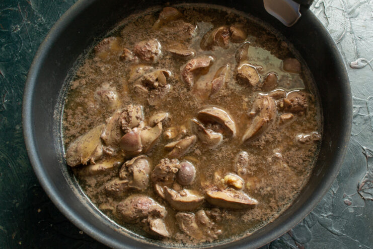 Blanching The Livers Chicken livers blanching in a pot of boiling water