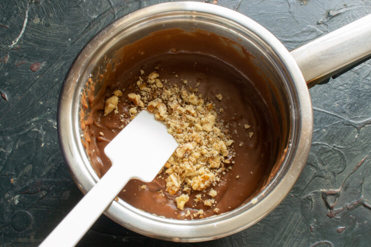 Nutty Cream Mixture Folding walnuts into the chocolate cream