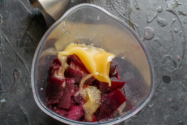 Seasoning The Spicy Sauce Adding honey and salt to the beet and horseradish mixture