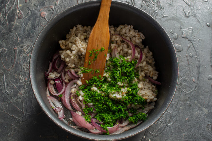 Herbs for aroma Adding finely chopped fresh dill to the pearl barley mixture