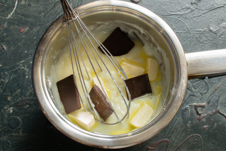 Chocolate Custard Adding chocolate and butter to hot custard