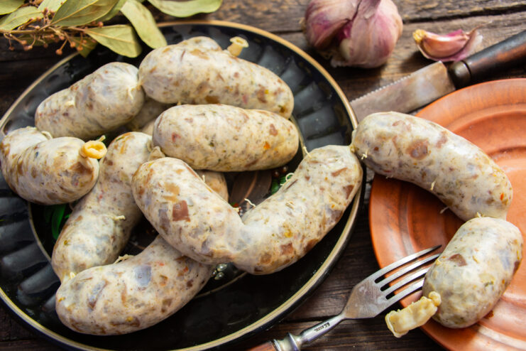 Homemade chicken gizzard sausages served on a plate