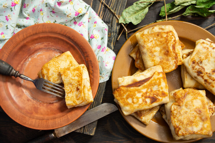 Stuffed crepes with Savoy cabbage served on a plate
