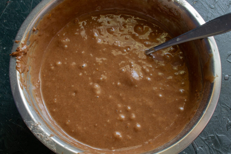 Finished batter Smooth and slightly runny chocolate batter in a bowl