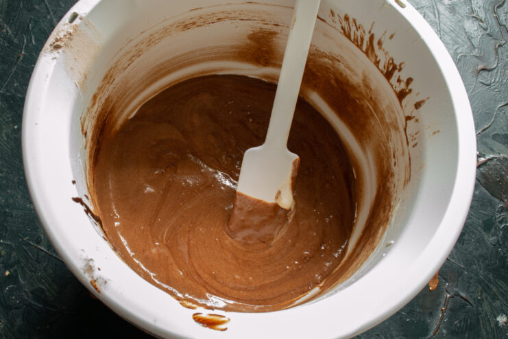 Chocolate batter Finished chocolate genoise batter in a mixing bowl