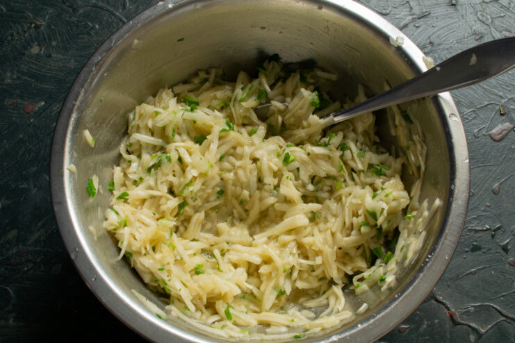 Ready to fry batter Fully mixed Jerusalem artichoke fritter batter in a bowl