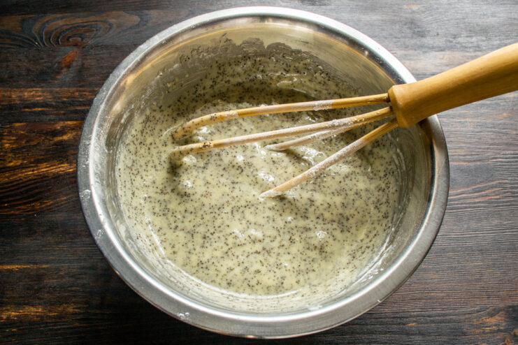 Resting the runny batter Finished runny poppy seed cake batter resting in a mixing bowl