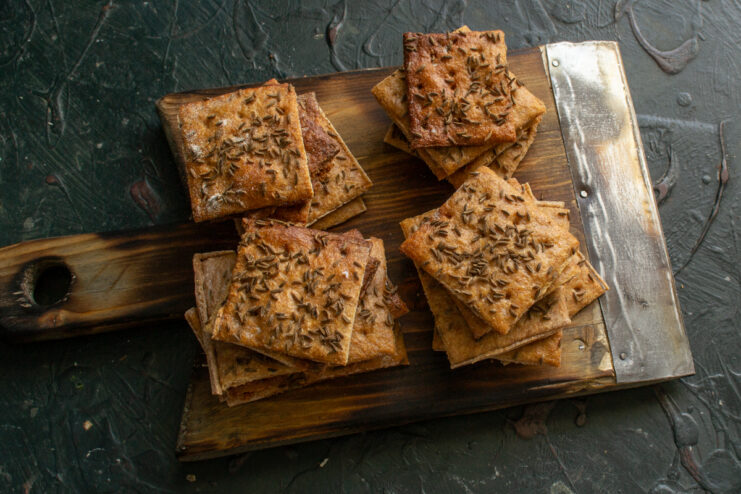 Storing rye snacks Stack of homemade crispy rye flatbreads ready for serving