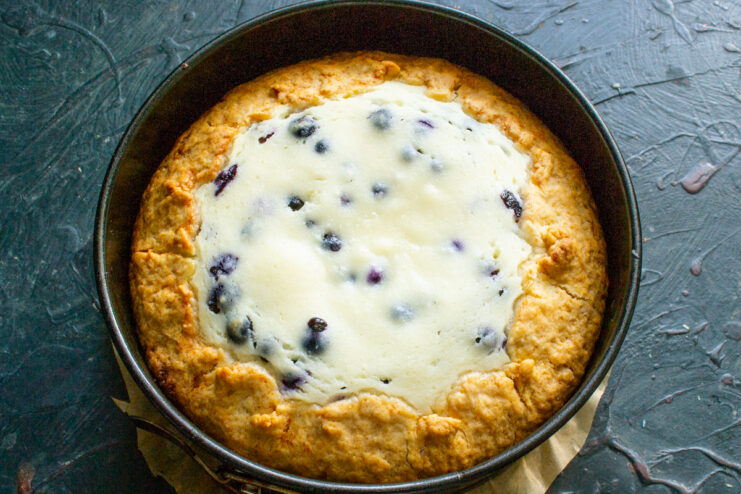 The freshly baked pie in the pan Baked pie in a pan with golden crust edges