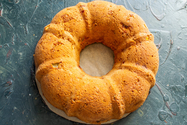 Removing cake from the pan Unmolded baked cake resting on a flat work surface