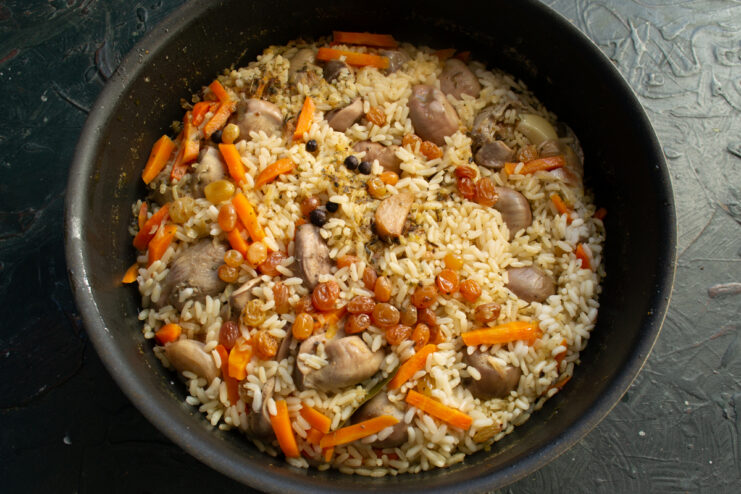 Finished Turkish pilaf with raisins and nuts in a pot