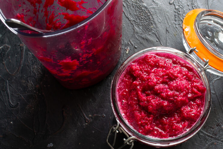 Finished Beet Horseradish Bright red beet horseradish sauce in a glass jar