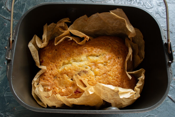 Cake after baking Baked golden cake inside the pan
