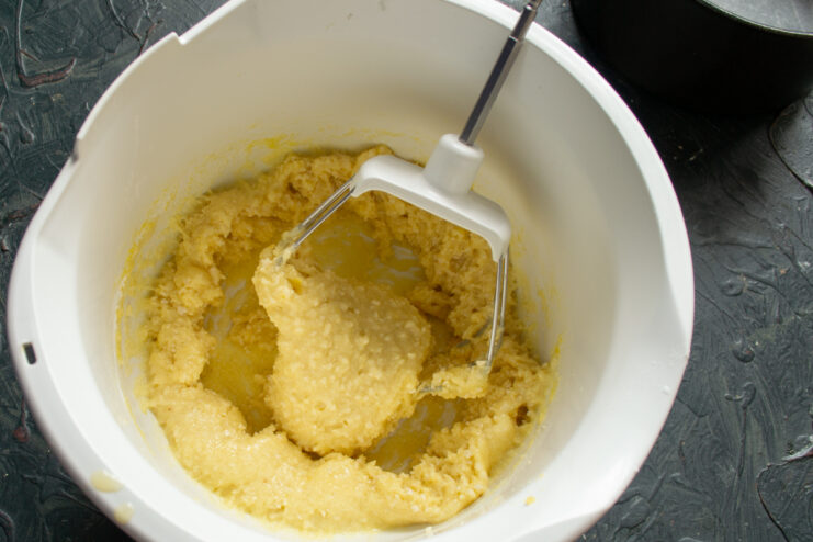 Batter Consistency Before Egg Whites Thick and sticky nut batter in a glass bowl