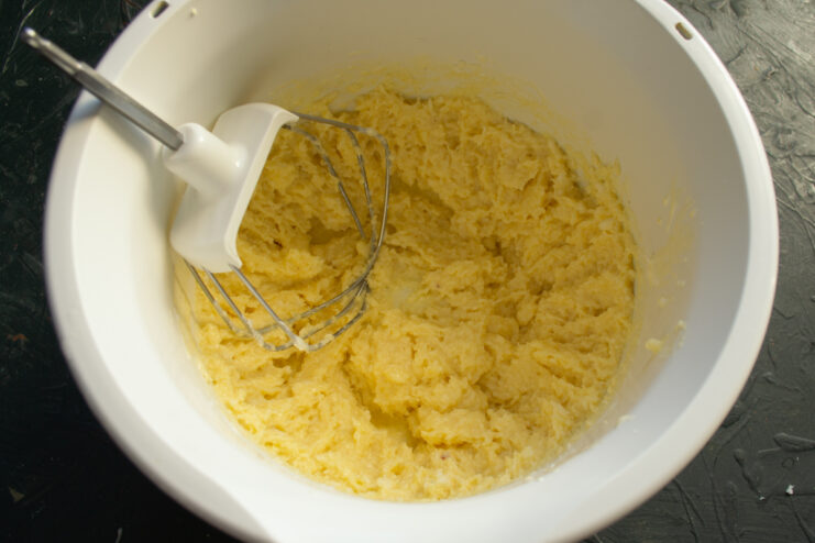 Dough consistency Thick and viscous coconut cookie dough in a mixing bowl
