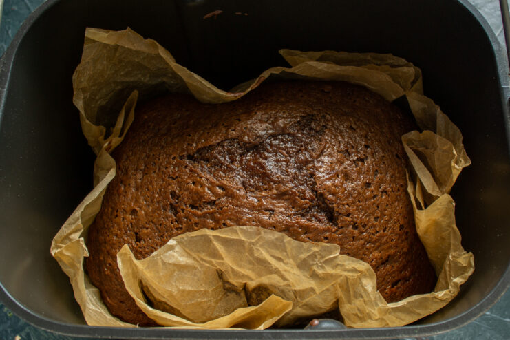Baked sponge cake Freshly baked and risen chocolate sponge cake in a pan