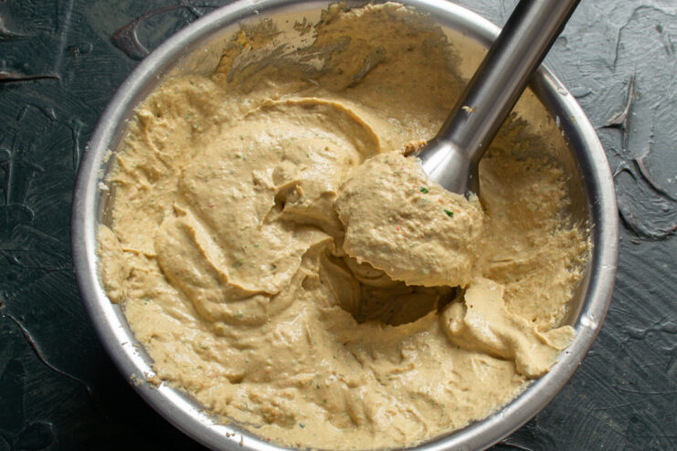 Blending ingredients together Blending ingredients with an immersion blender into a smooth cream
