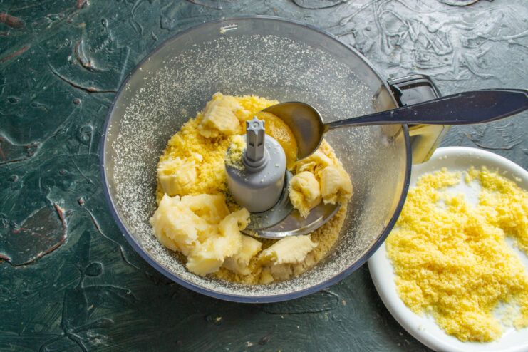 A spoonful of buckwheat honey poured into the cake mixture