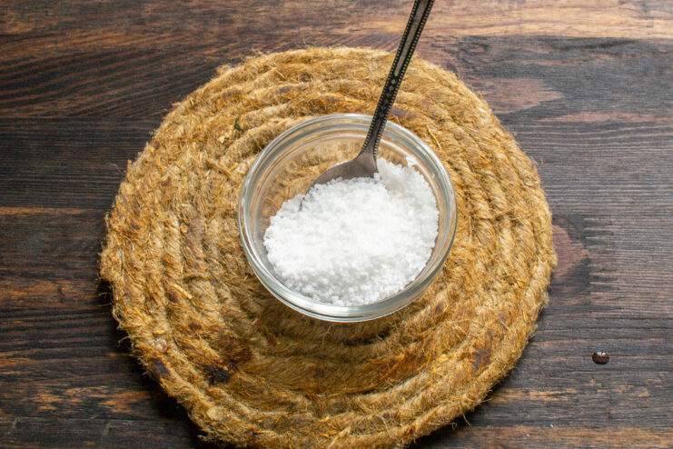 Mixing the curing salt Coarse sea salt and sugar mixture in a glass bowl