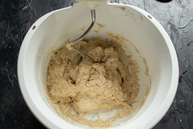 Initial dough mixing Dough hook attachment mixing bread ingredients in a stand mixer