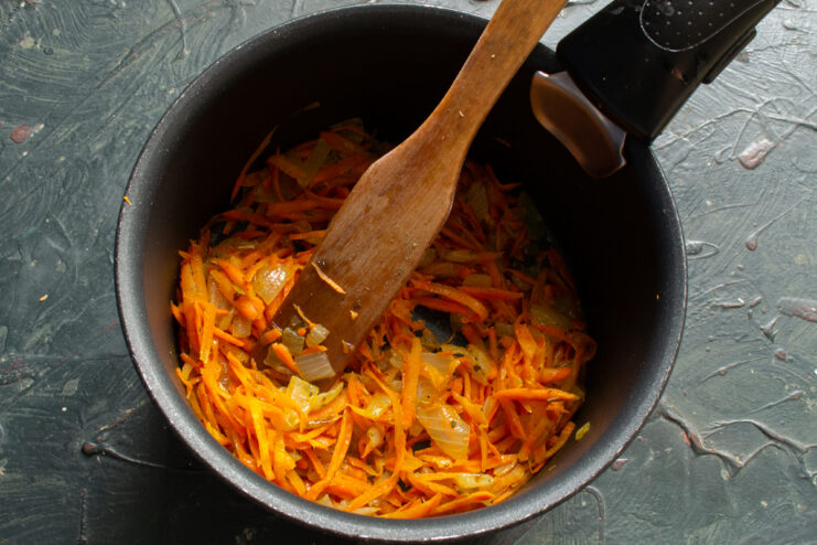 Vegetables with dried herbs Sautéed vegetables mixed with dried Herbes de Provence in a cooking pot.