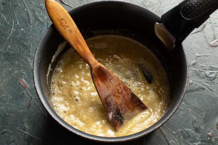Making the roux Toasting flour with melted butter in a small saucepan