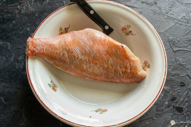 Cleaning and Prepping Cleaned and trimmed ocean perch in a white bowl