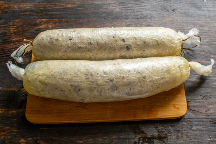 Rapid Chilling Chilling freshly poached sausages in a bowl of ice water